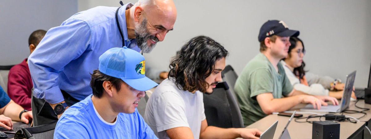 Students engaged in learning with Dr. Halit Uster in one of his OREM classes at SMU Lyle