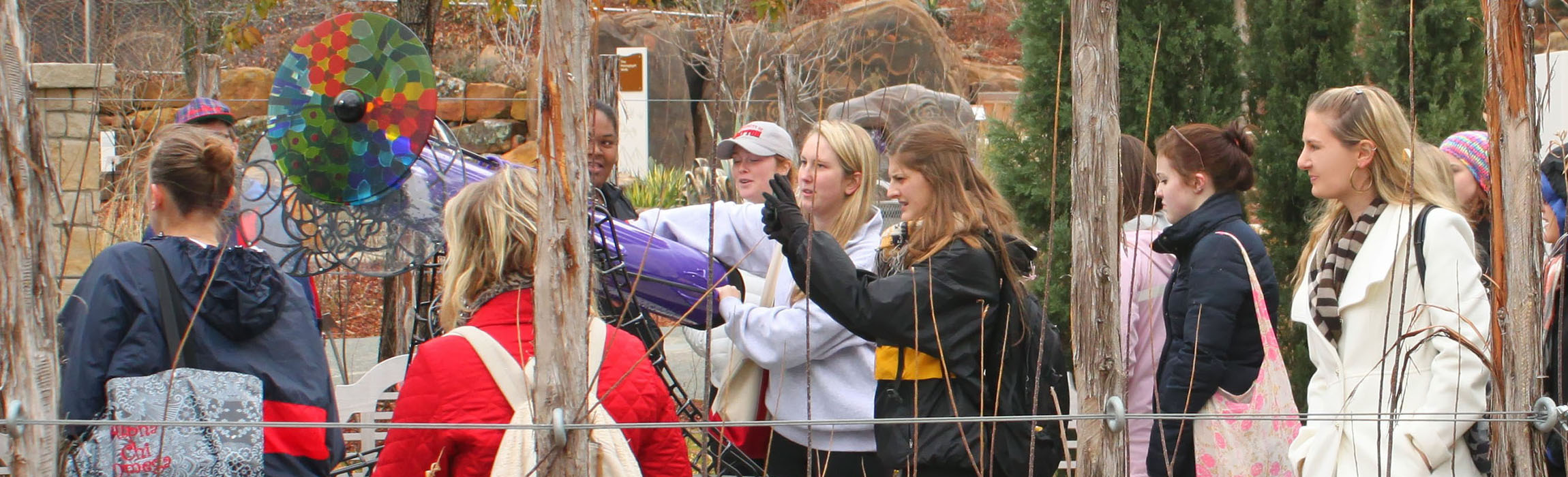 Dr. Walkington and students research walk at the Arboretum in Dallas Texas.